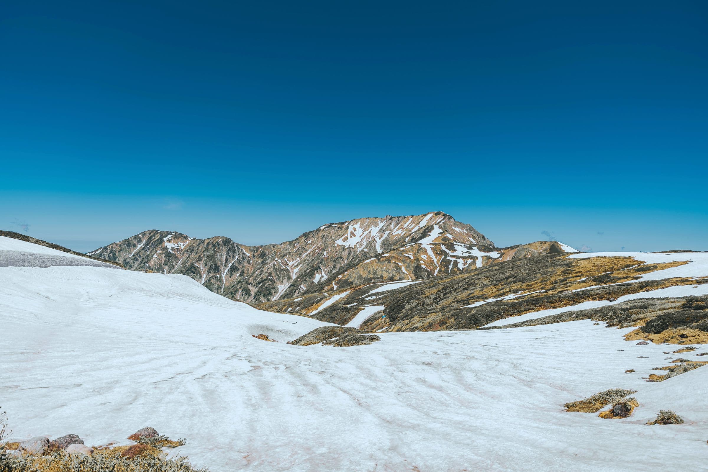 Snow-covered Tateyama peaks in the Japan Alps — mountain approach into ski country